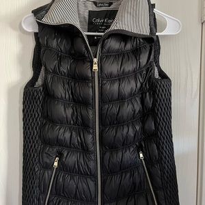Black puffy vest size medium Calvin Klein.